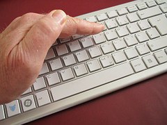 hand on keyboard secretively